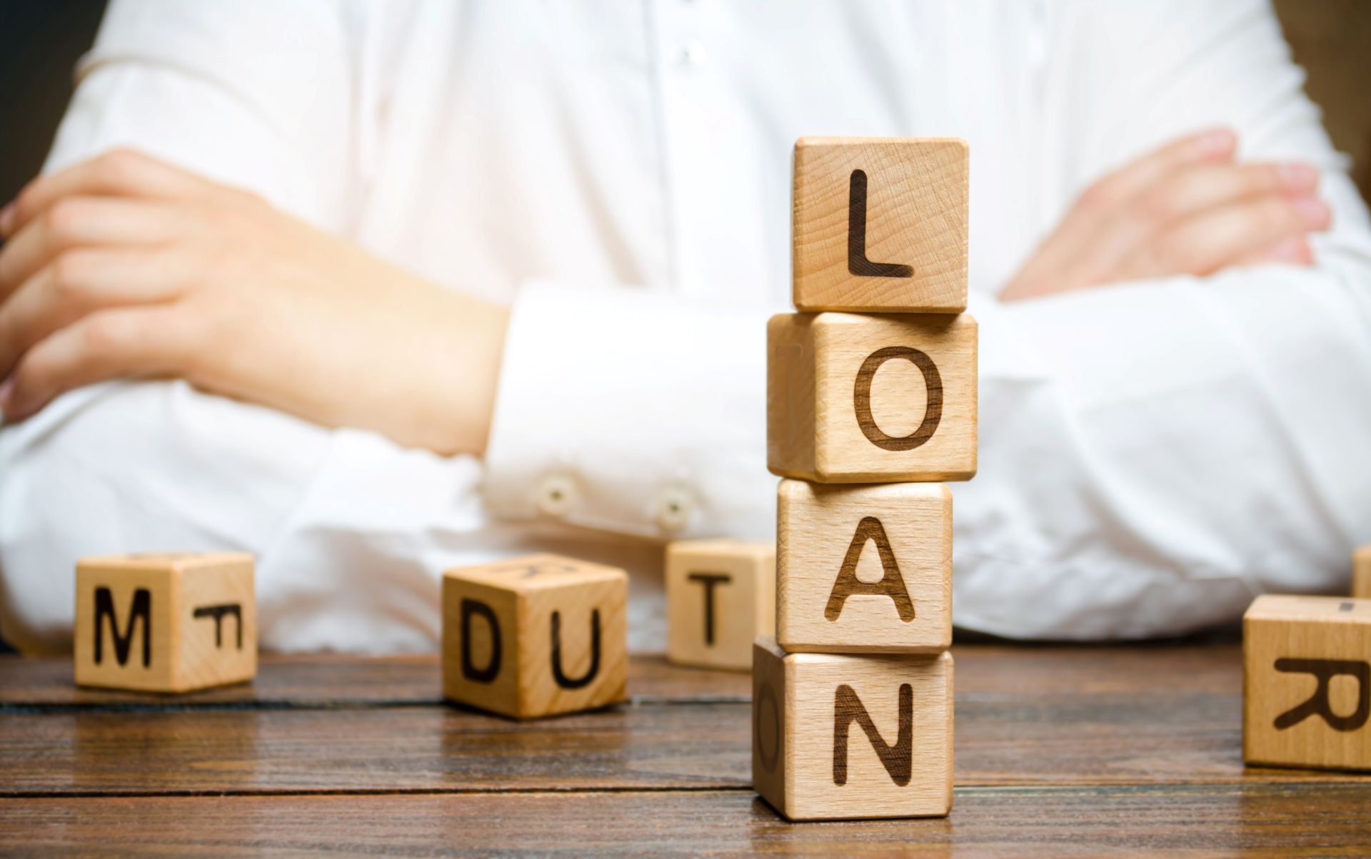 quickloanstexas loan word stacked on wooden blocks